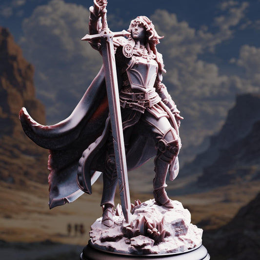 A detailed 3D model of a female warrior figure, standing on a rocky base and holding a sword in her right hand.