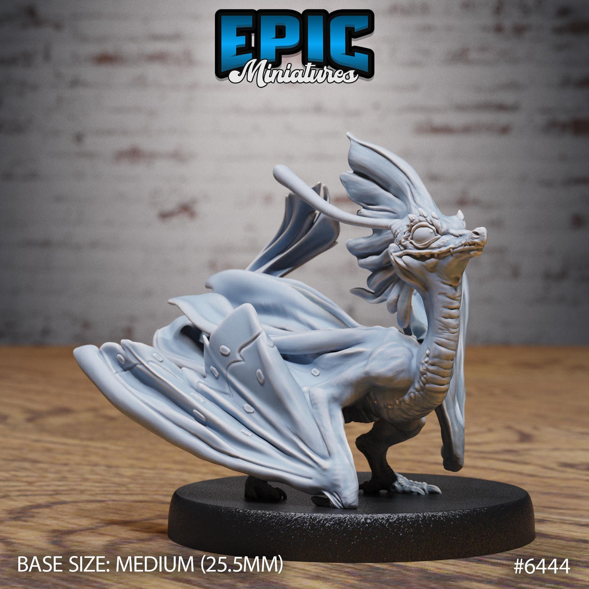 A 3D model of a dragon-like creature, possibly a miniatures model, displayed on a wooden surface against a brick wall background.