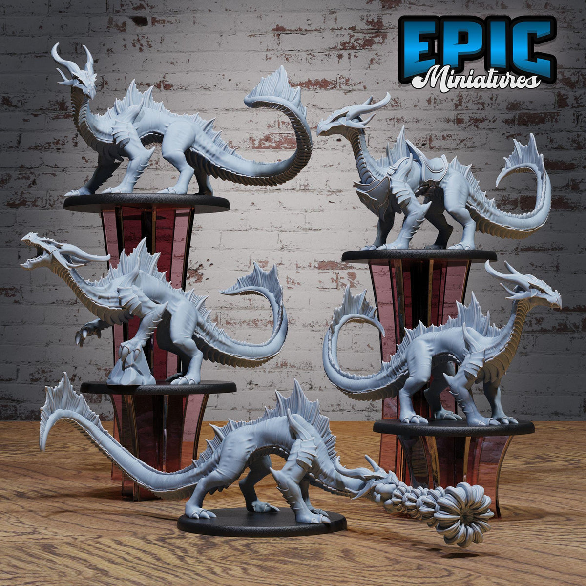 A collection of six detailed, miniature figurines of fantastical creatures, likely from a fantasy or science fiction game, displayed on platforms against a brick wall background.