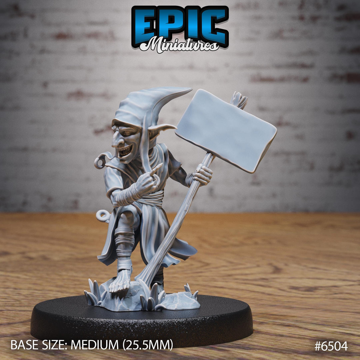 A figurine of a gnome-like character holding a blank sign, standing on a base.