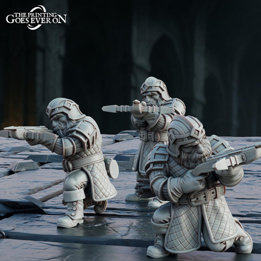 three dwarfs, each holding a weapon, standing on a rocky surface.