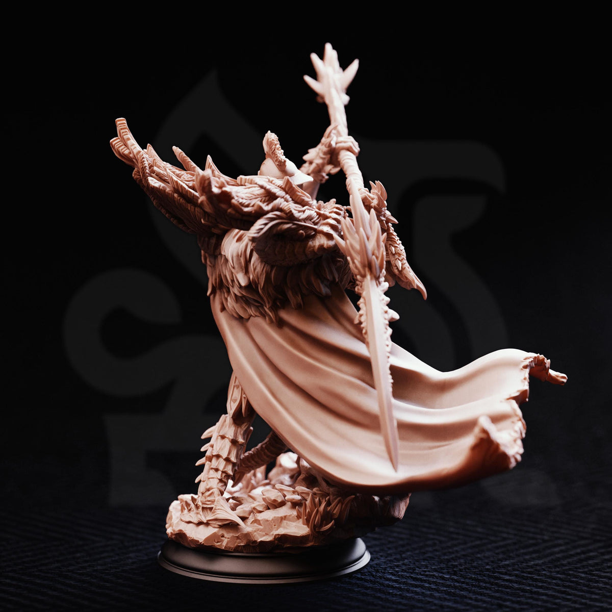 A detailed, intricate figurine of a dragon-like creature with flowing robes and sharp claws, standing on a base against a dark background.