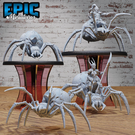 a collection of miniature figurines depicting various fantastical creatures, including large spider-like creatures and other mythical beings.