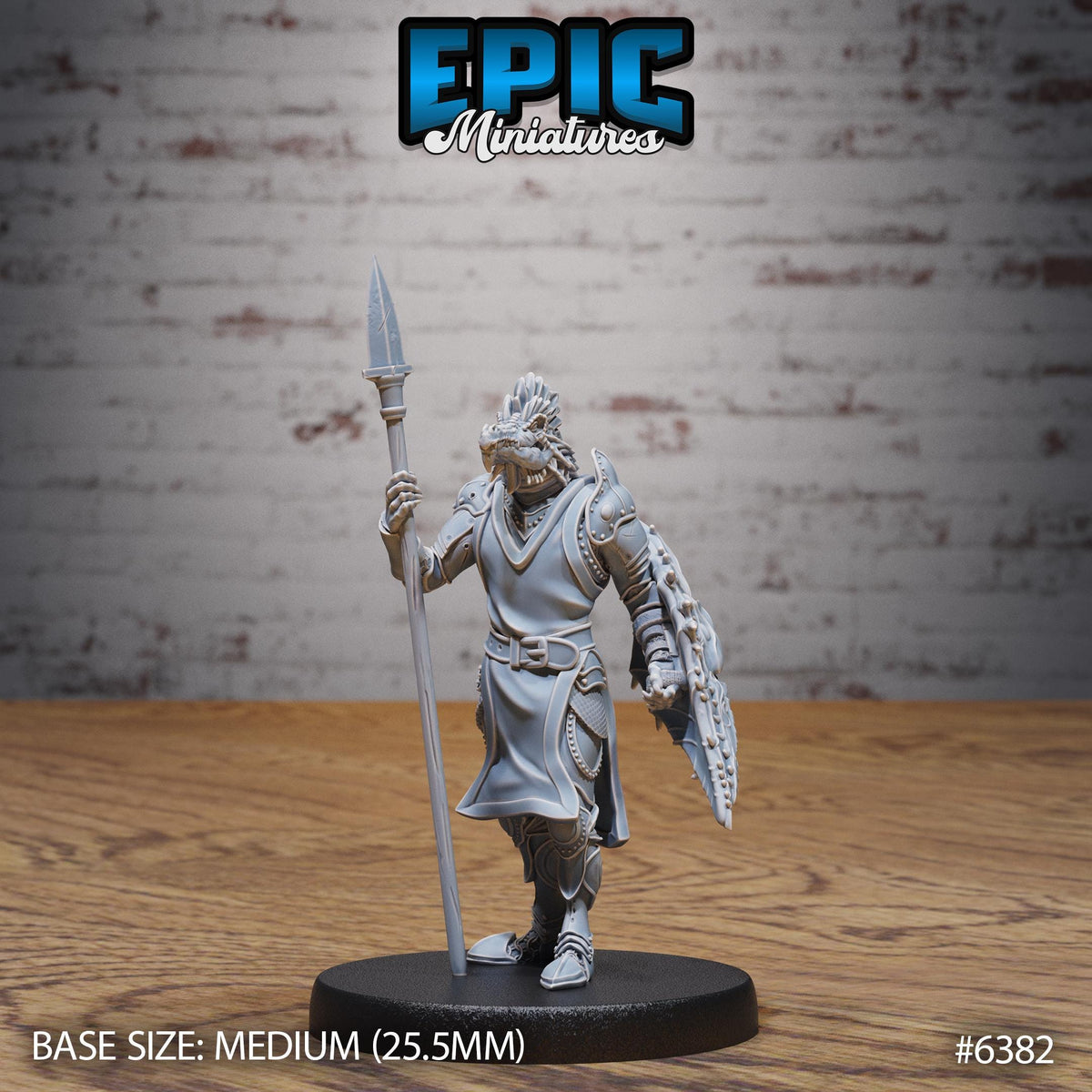 A figurine of a warrior standing on a wooden surface, holding a spear and shield, with the text "Epic Miniaturies" above it.