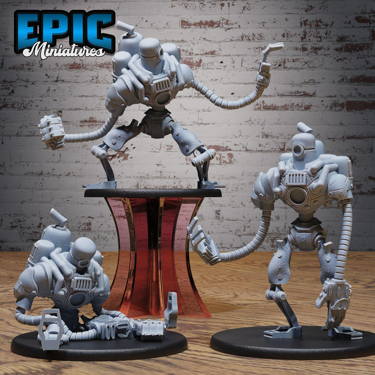three robotic figures, each with unique poses and designs, set against a brick wall background.