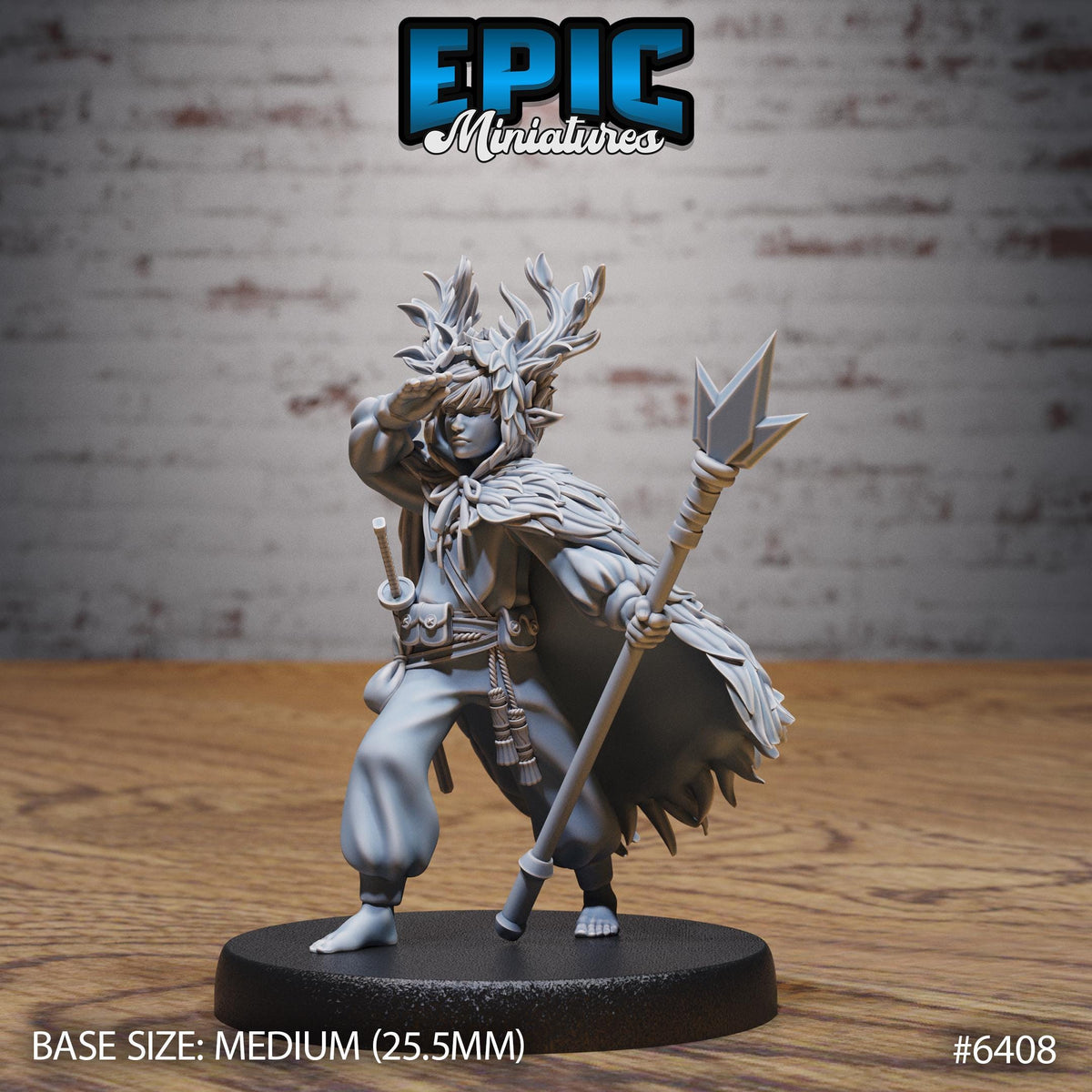 A figurine of a person in a fantasy role, wearing a headdress and holding a spear, standing on a black base.