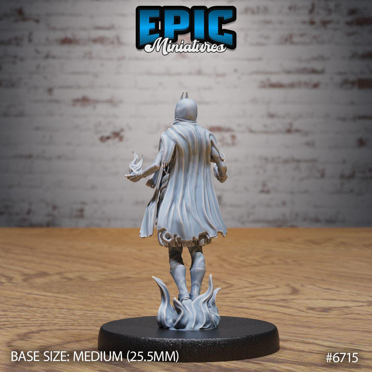 A figurine of a person in a cape, standing on a black base, against a brick wall background.