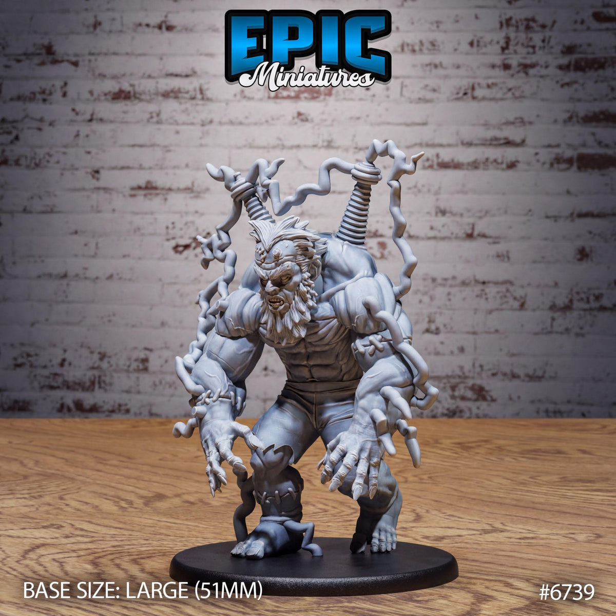A large, detailed figurine of a monster-like creature with multiple arms and sharp claws, standing on a black base.