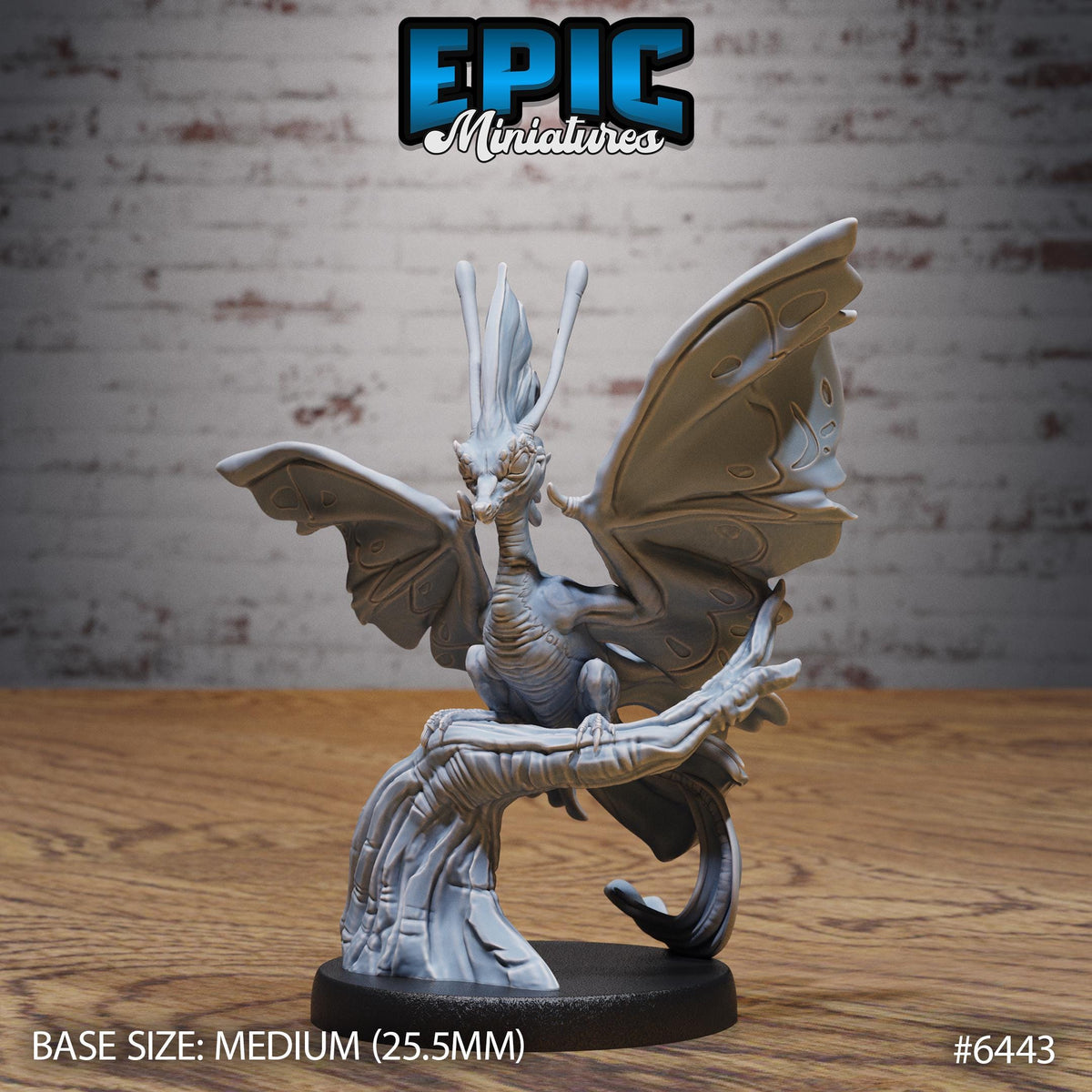 A 3D model of a dragon figurine, with wings spread wide, sitting on a wooden surface against a brick wall background.