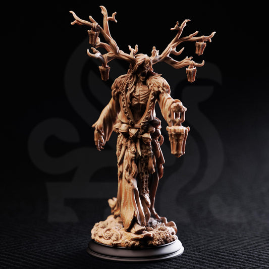 A detailed sculpture of a figure with a long, flowing robe and a headdress, standing on a base and holding a lantern.