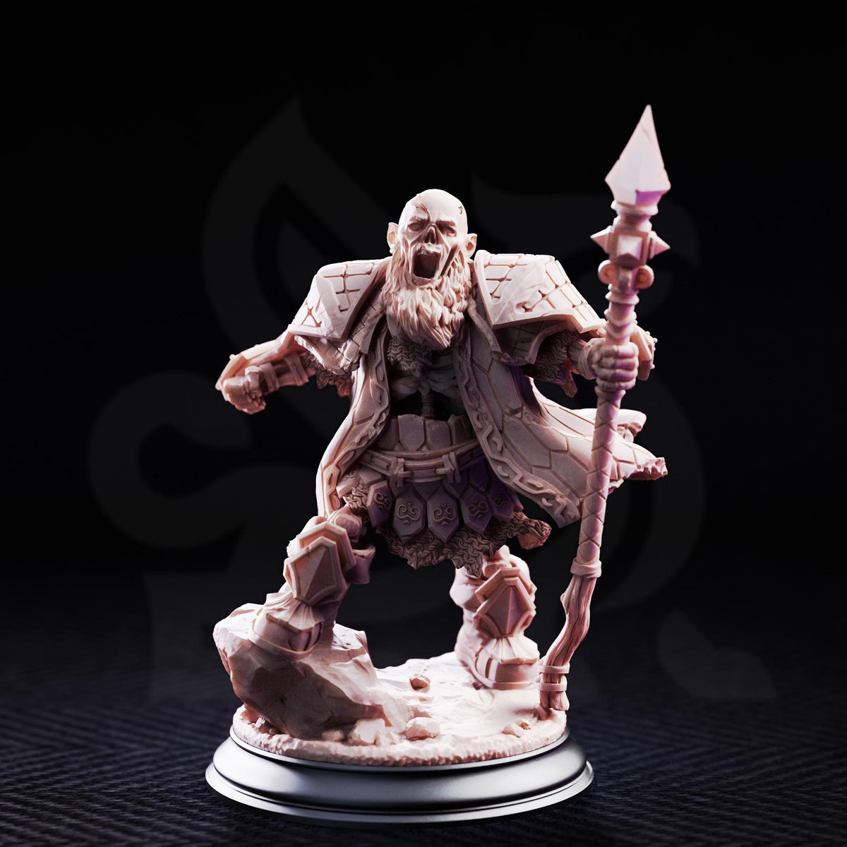 A detailed figurine of a bearded, armored figure wielding a spear, standing on a rock formation against a dark background.