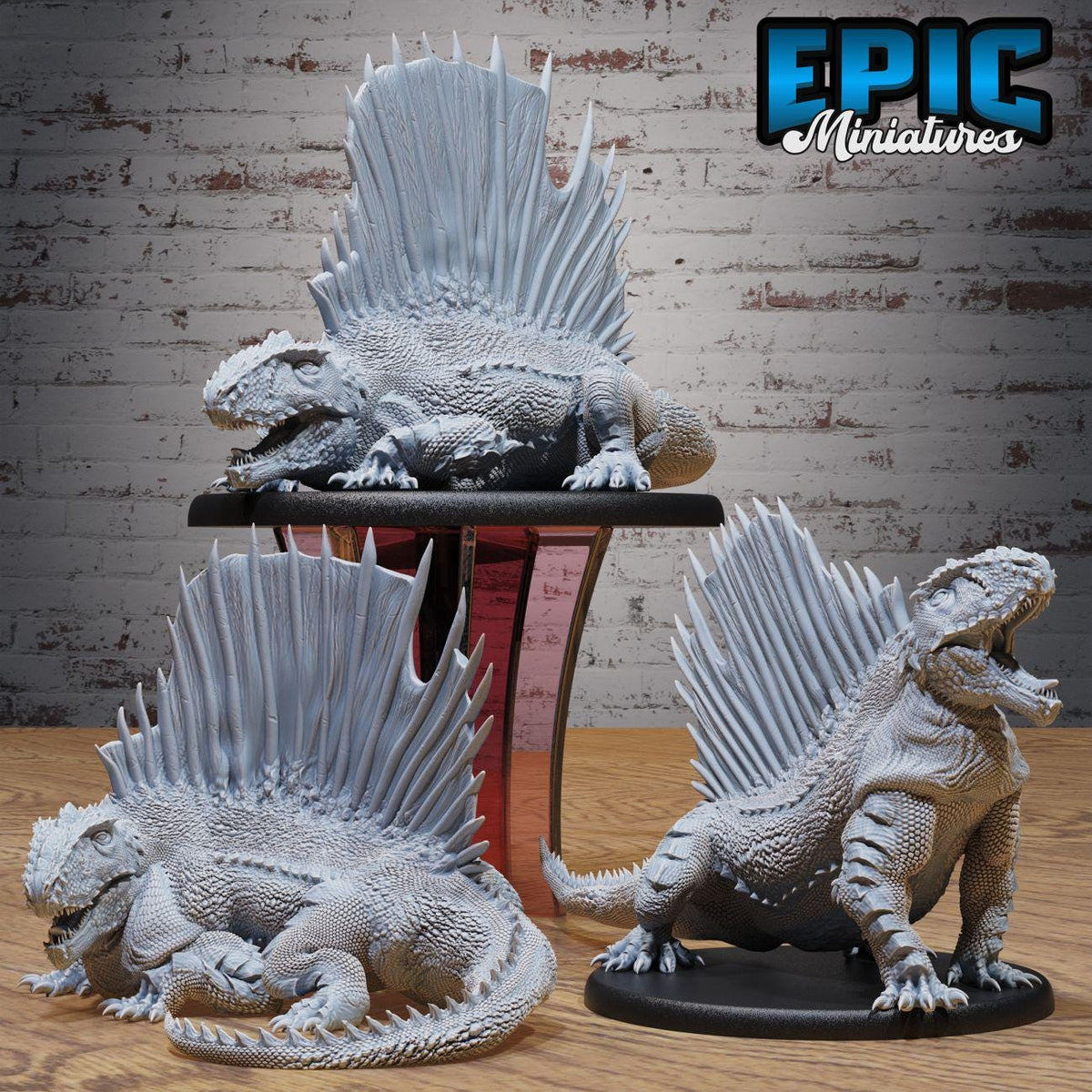 three detailed, miniature dinosaur figurines displayed on a stand against a brick wall background.