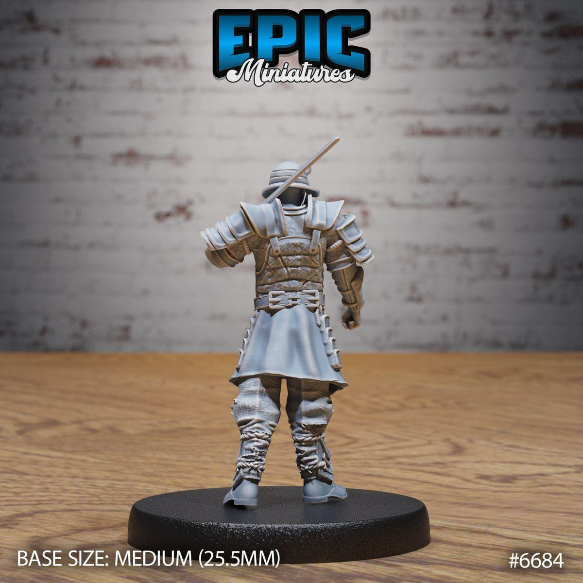 A figurine of a warrior standing on a black base, wearing a helmet and armor, with a sword in hand. The figurine appears to be made of a material that resembles plastic or metal.