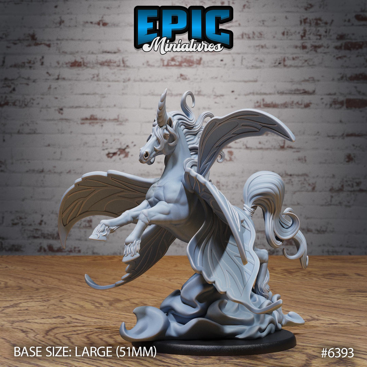 A large gray sculpture of a winged creature, possibly a mythical or fantastical being, displayed on a wooden surface against a brick wall background.