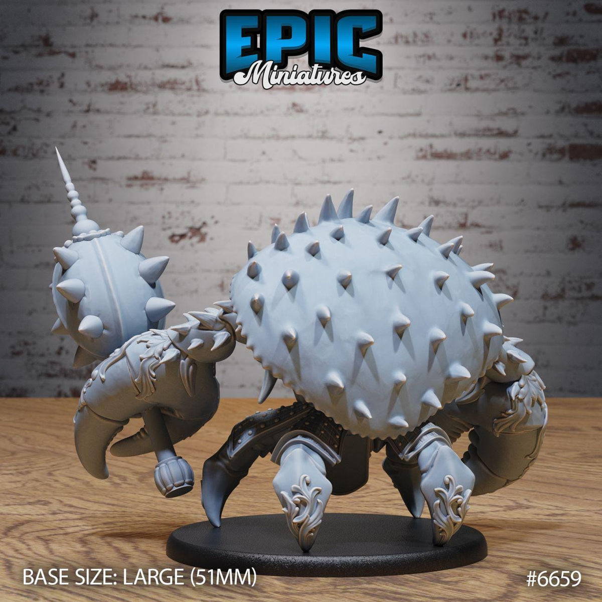 a large figurine of a creature with spikes on its back, sitting on a black base.