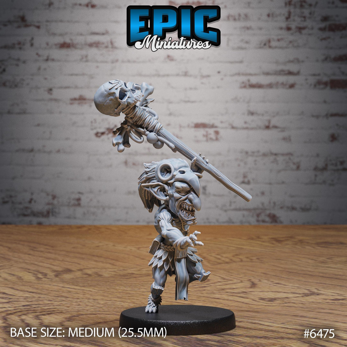 A figurine of a character with a skull-like head and a long stick, standing on a black base. The figurine appears to be a miniature model of a character from a video game or tabletop game.