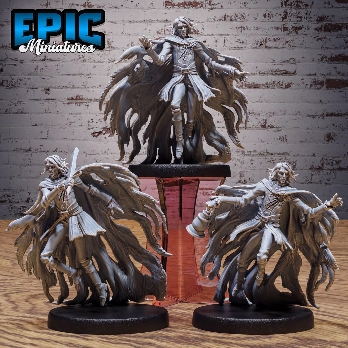 three figurines of a fantasy character, each with unique poses and expressions, set against a brick wall background.