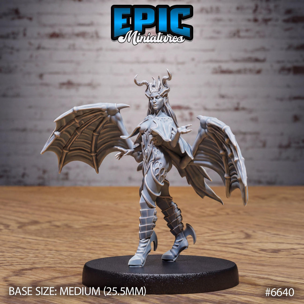 A figurine of a winged, winged creature with horns and claws, standing on a black base. The figurine appears to be a miniature model of a fantastical or mythical creature.