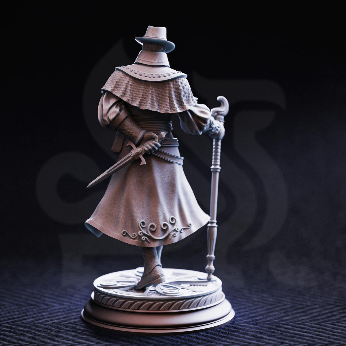 A statue of a person wearing a hat and holding a cane, standing on a pedestal.