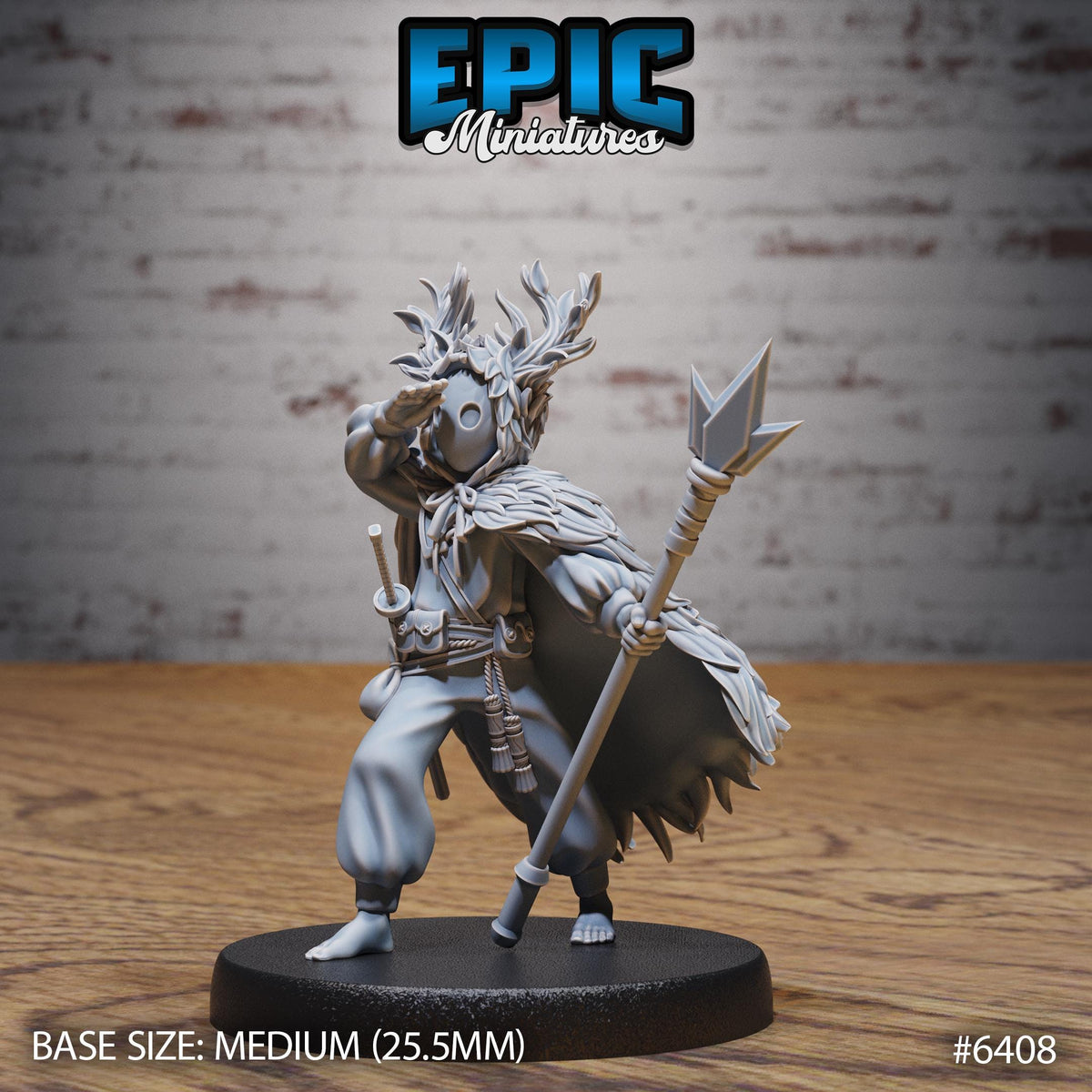 A figurine of a character with a large headdress and a staff, standing on a black base.