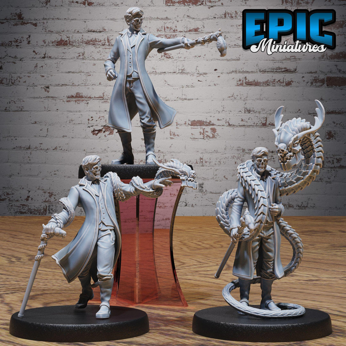 three figurines of characters from a video game, displayed on a wooden surface against a brick wall background.